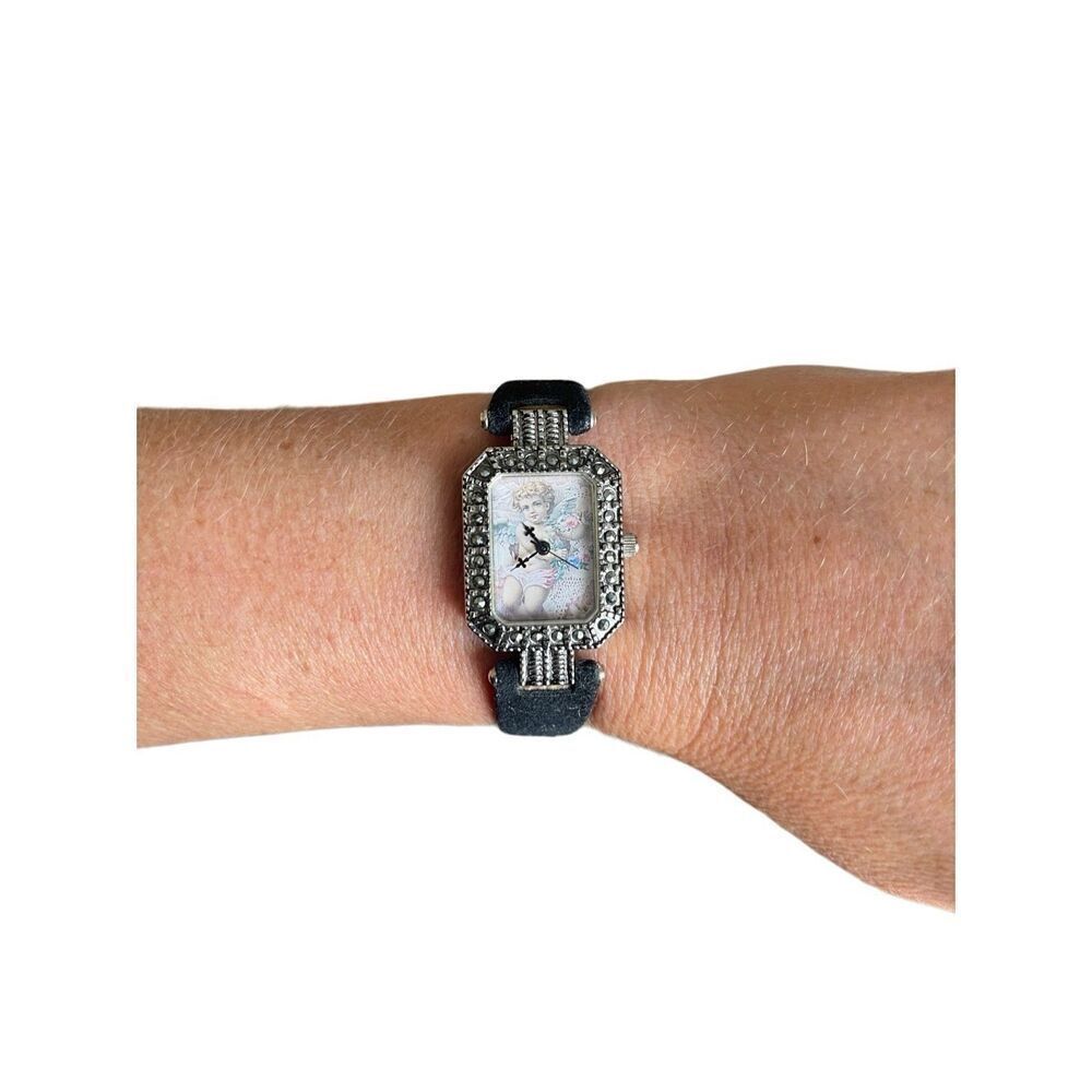 Vintage 90s stainless steel cherub‎ watch on velour band